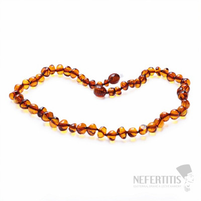 Polished baroque amber beads for children color cognac