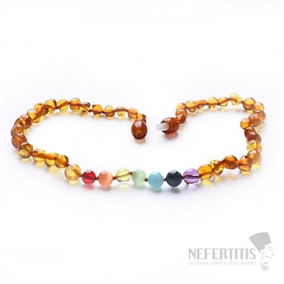 Amber beads for children polished in the color of cognac chakra