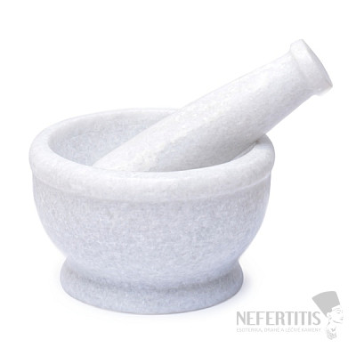 A mortar with a white marble mallet for crushing fumes