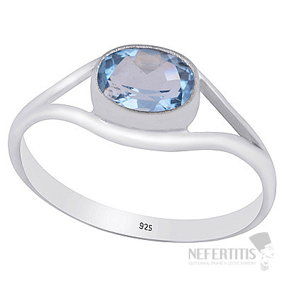 Silver ring with blue topaz