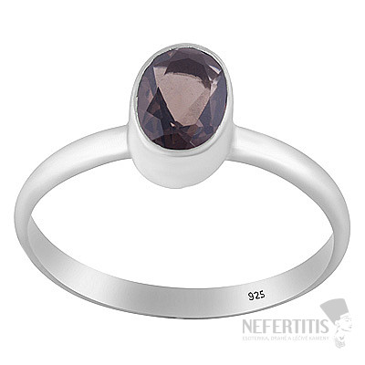 Silver ring with brownish hue