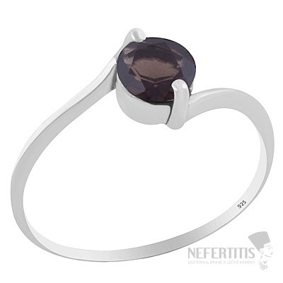 Silver ring with brownish hue