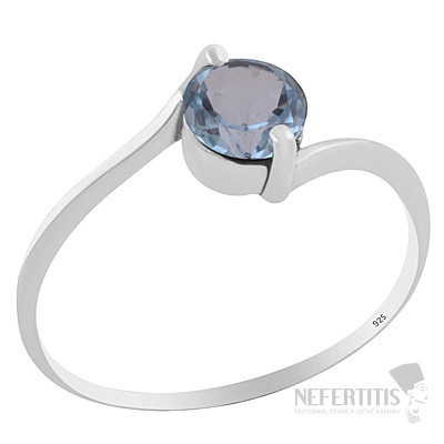 Silver ring with blue topaz