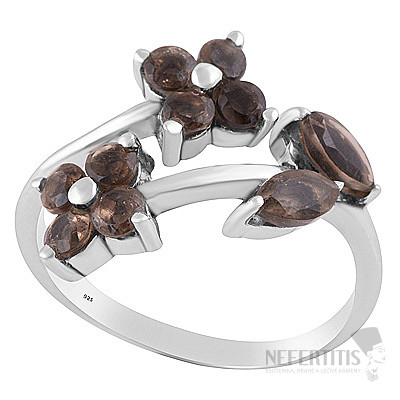 Silver ring with brownish hue