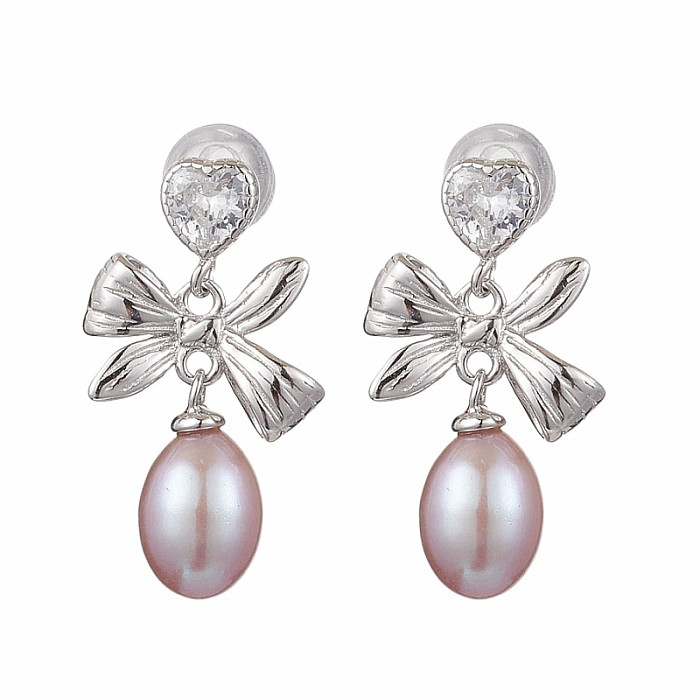 Stříbrné náušnice Mašle s perlou - cca 2,7 cm