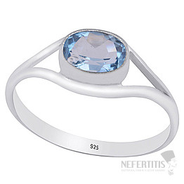Silver ring with blue topaz