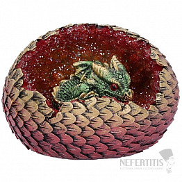 Statuette of a green dragon in an egg