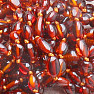 Jantarové korálky pro děti leštěné fazolky v barvě koňaku