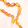 Jantarové korálky pro děti leštěné fazolky v barvě medu