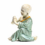 Buddhistický mnich soška chlapce Namasté kolorovaná