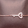 Třpytivý stahovací náramek barvy růžového zlata Klíč s kubickou zirkonií